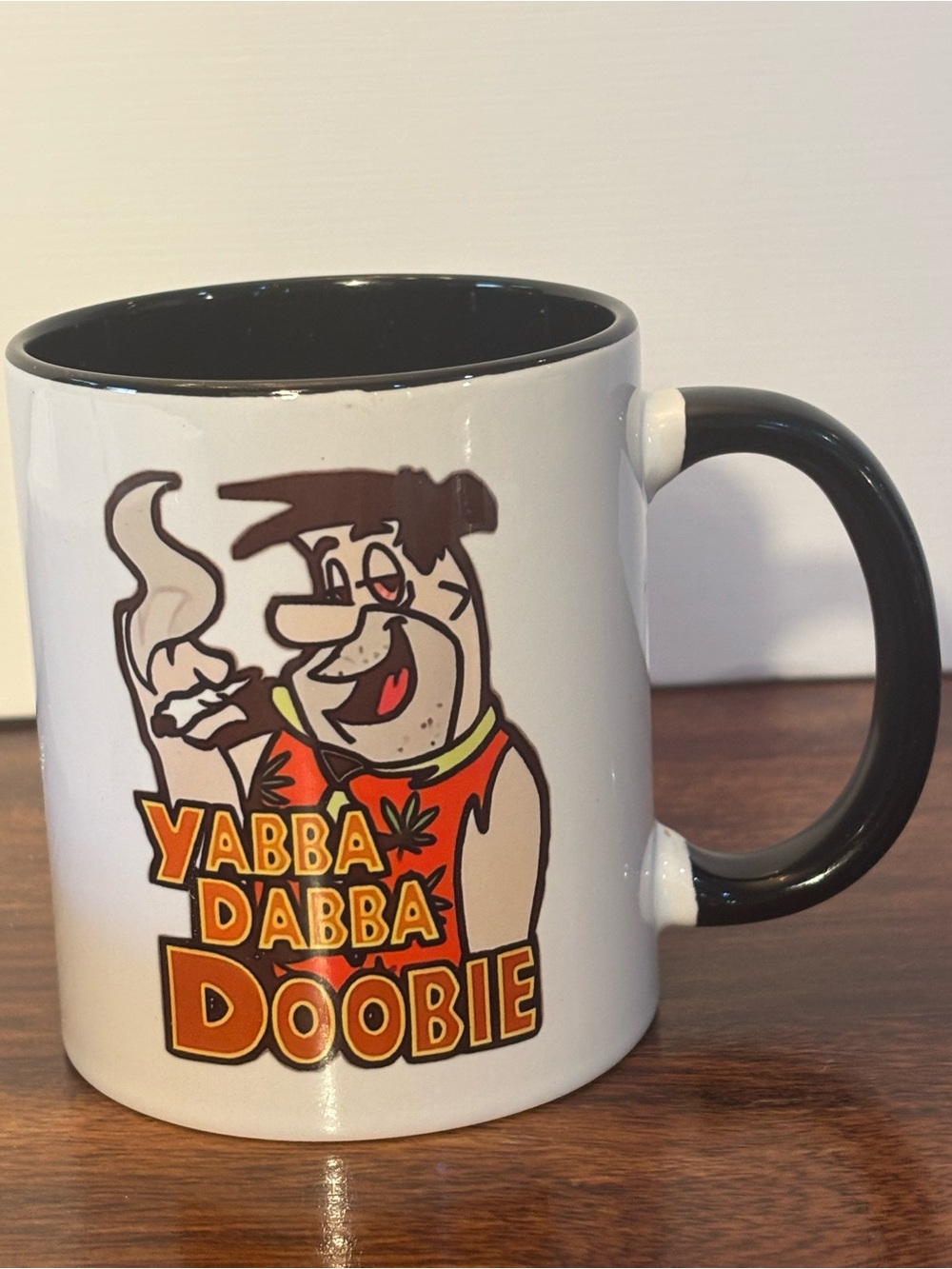 Novelty White Ceramic Coffee Mug with Black Handle - Yabba Dabba Doobie Design